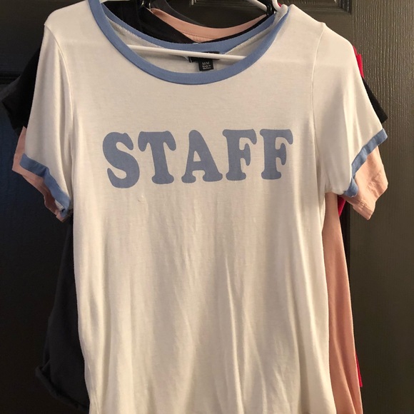 Cute white and baby blue T-shirt. Says. STAFF - Picture 1 of 2